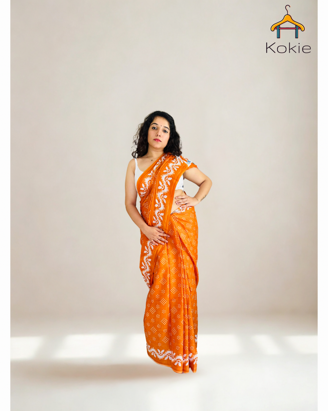 Rustic Charm – Handwoven Cotton Saree in Orange & Off-White